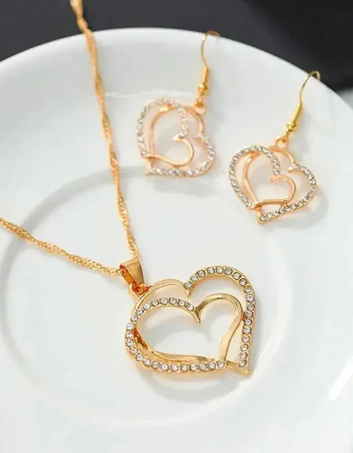 Load image into Gallery viewer, 3 Pcs Set Heart Shaped Jewelry Set Of Earrings Pendant Necklace For Women Exquisite Fashion Rhinestone Double Heart Jewelry Set
