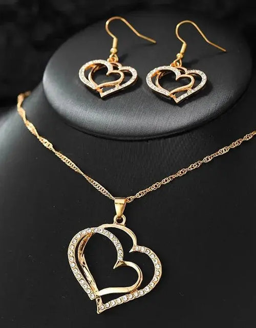 Load image into Gallery viewer, 3 Pcs Set Heart Shaped Jewelry Set Of Earrings Pendant Necklace For Women Exquisite Fashion Rhinestone Double Heart Jewelry Set
